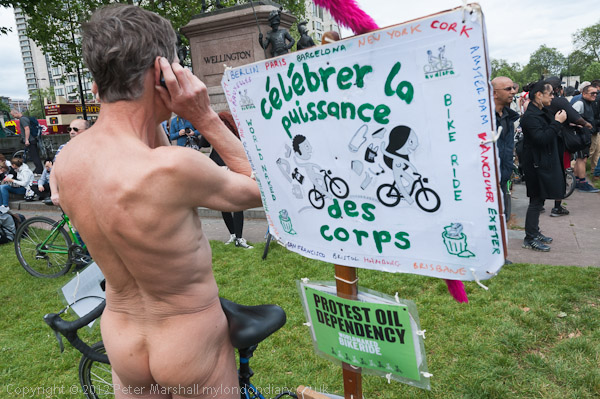 Naked Cyclists Ride Against Oil